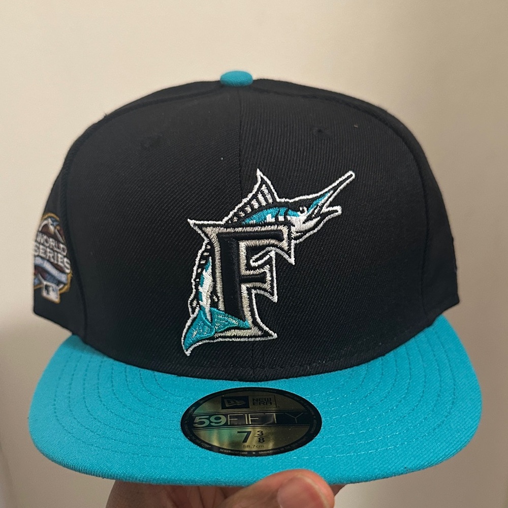 New Era Black and Teal Hat